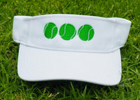 white visor with green tennis